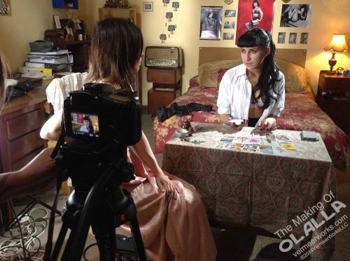 Ready to shoot, radio in place with Bettie posters on the wall.