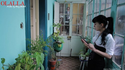 Holding the riding crop, Ofelia awaits Uncle Felipe who will use it where needed.